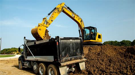 loading mini excavator in dump truck|excavator loading techniques.